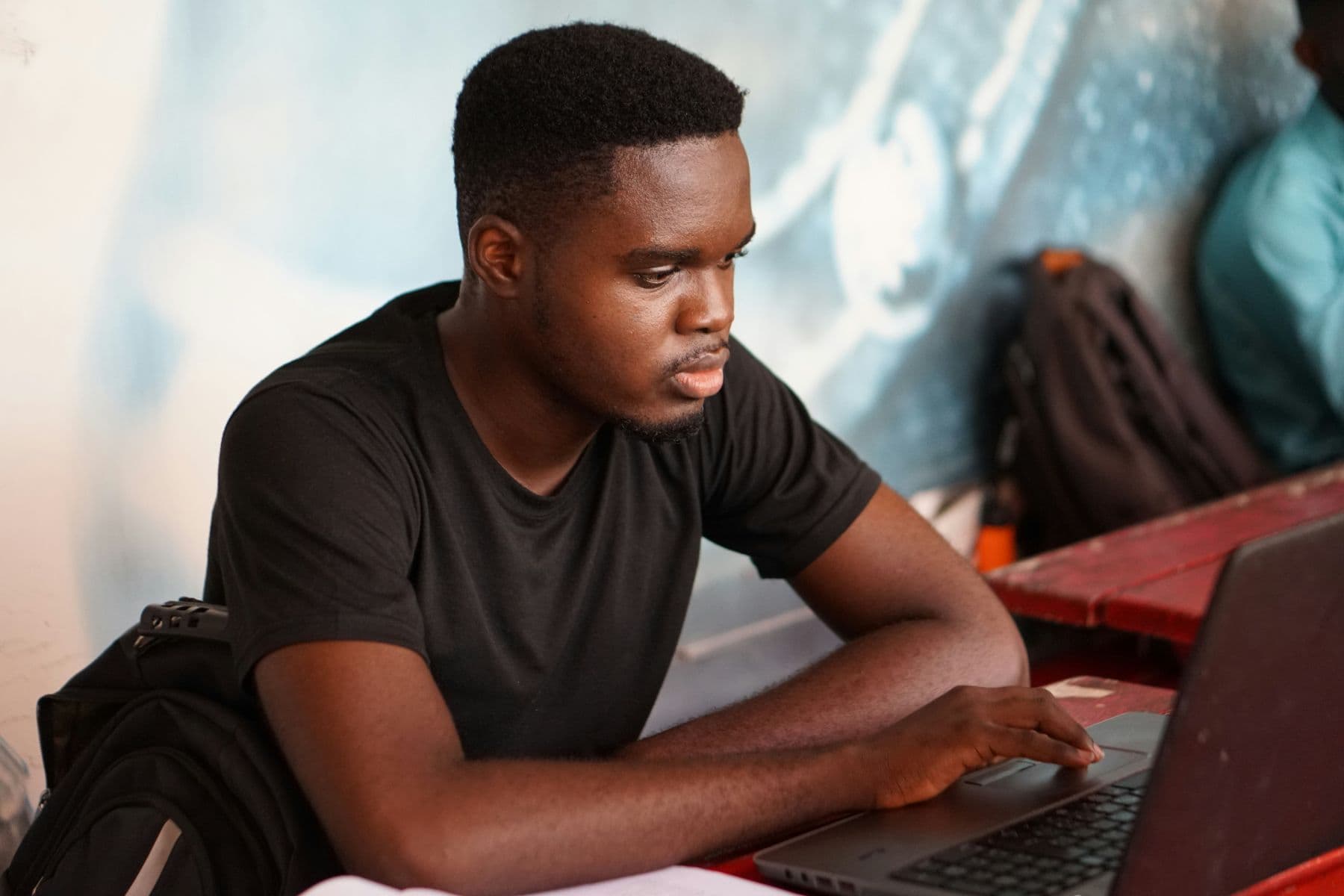Young professional working on a laptop